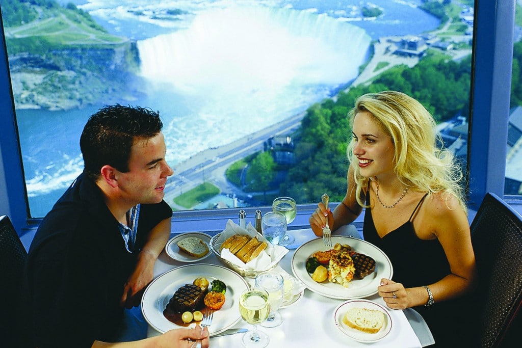 Couple enjoying dinner at a Niagara Falls restaurant